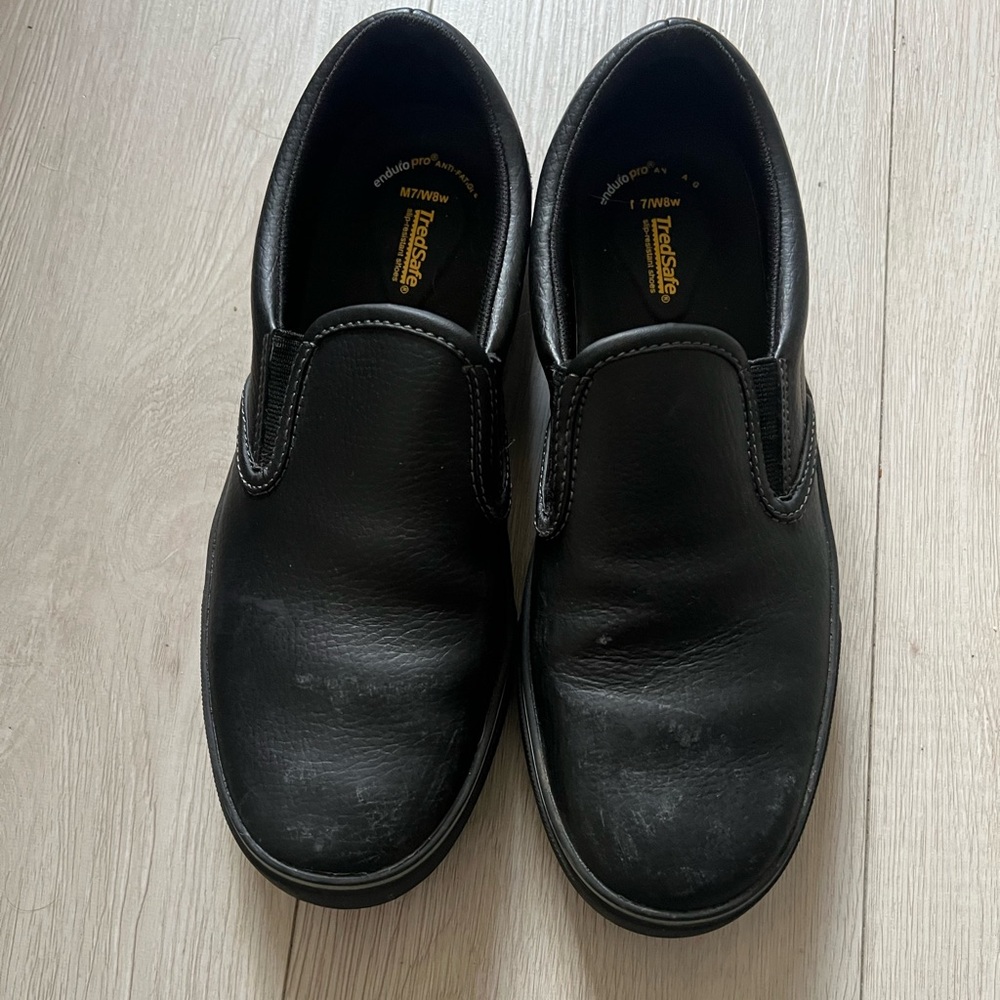 Brand new black tread safe slip on work shoes